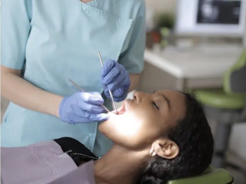 dentist checking up client jersey village tx