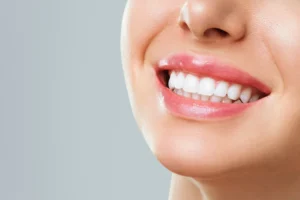woman smiling with full restore teeth houston tx